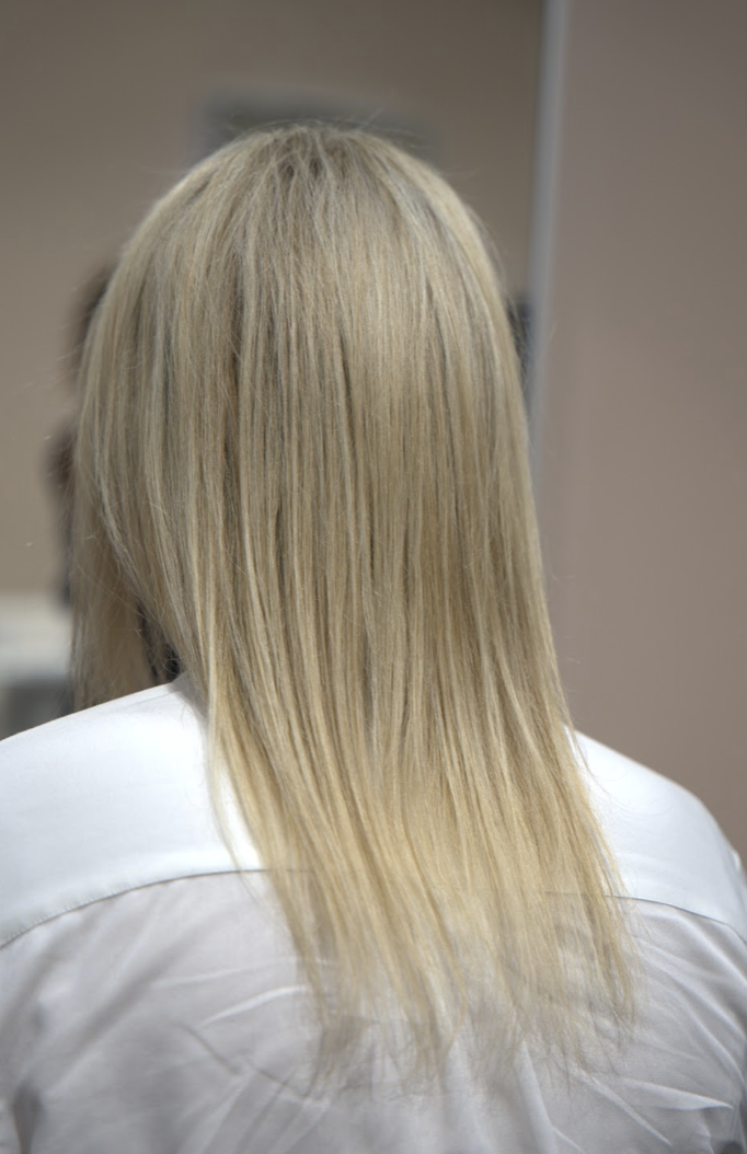 The finished result of a sleek, glossy blonde